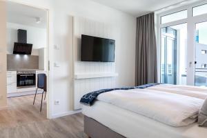 Godewindpark Deluxe-Apartment 2-07 mit Strandkorb am Strand