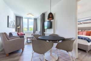 Deluxe-Apartment 2-10 mit Balkon und schönem Gartenblick