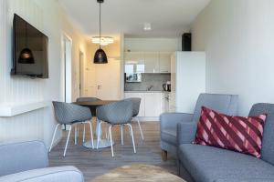 Deluxe-Apartment 2-10 mit Balkon und schönem Gartenblick