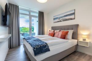 Deluxe-Apartment 2-10 mit Balkon und schönem Gartenblick