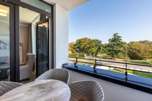 Godewindpark Deluxe-Apartment 2-12 mit eigener e-Ladesäule in der Tiefgarage und XL-Strandkorb am Strand