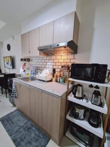 Studio with Balcony plus City View at Inspiria with Fast WiFi & Free Netflix