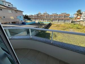 Cód 179 - Apartamento a 70m do mar com 2 dormitórios em Palmas