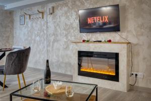 LEscapade Enchantée - Spa, Cheminée et Cinéma