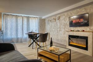 LEscapade Enchantée - Spa, Cheminée et Cinéma