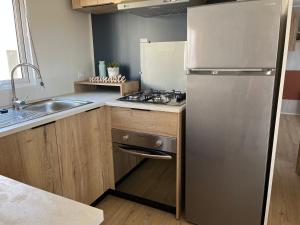 MH 399 3 chambres et 2 salles de bain entièrement équipé dans camping 4 étoiles