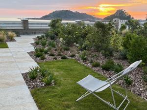 LA ROCHE MIGNONNE T3 jardin et vue