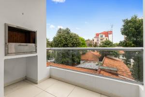 Apartamento de 1 Dormitorio con Parrilla y Cochera ! Dpto 201