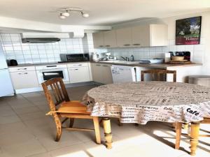 1-bedroom apartment with view of private beach
