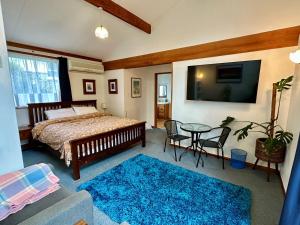 Cozy and quiet studio apartment with shared spa pool - 4hvězdičkové hotely ve městě Dunedin