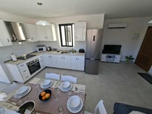 Bright Coastal Penthouse with Huge Terrace Overlooking the Sea- Ghadira Mellieha