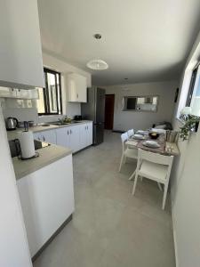 Bright Coastal Penthouse with Huge Terrace Overlooking the Sea- Ghadira Mellieha