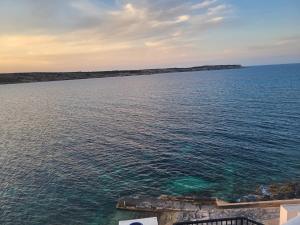 Bright Coastal Penthouse with Huge Terrace Overlooking the Sea- Ghadira Mellieha