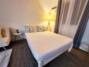 The Little Abode Nuvali - Smart Studio Unit with Balcony & free pool access