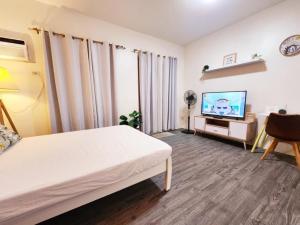 The Little Abode Nuvali - Smart Studio Unit with Balcony & free pool access