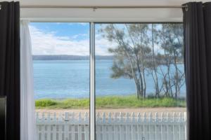 Beachfront Escape Relaxing Getaway in Batehaven