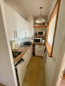 LÉterlodge Cosy - Studio au pied des pistes à Chamrousse - Ski in - Ski out - Idéal Séjours Famille ou Amis - Jusquà 4 personnes