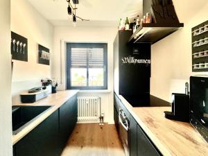 Designer-Oberstüberl mit Seeblick auf den Chiemsee & Alpenpanorama