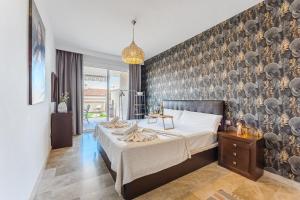 Modern apartment with large terrasse, bbq, fast wifi, 2 pools