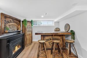 Bright and Modern 2BR Suite with Rustic Bar