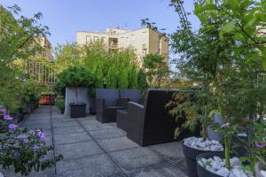 Bright & Chic 1BDR with shared rooftop terrace in San Babila