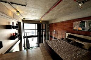 Central Medellin Modern Loft - Balcony and Transit