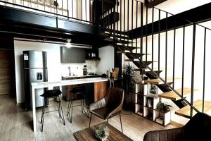 Central Medellin Modern Loft - Balcony and Transit