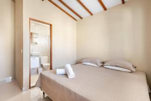 Casa com churrasqueira a 1km da praia do Curral