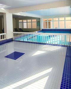 Apartamentos a 100m Praia das Toninhas PISCINA AQUECIDA