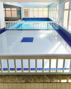 Apartamentos a 100m Praia das Toninhas PISCINA AQUECIDA