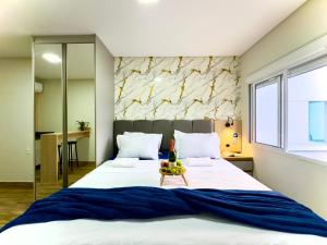 Studio aconchegante com piscina a 350m da praia