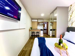 Studio aconchegante com piscina a 350m da praia