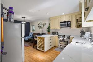 Condo next to a bird sanctuary by Discovery Park