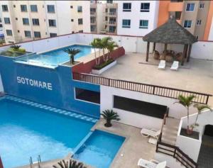 Relax en Tonsupa Moderno Depar con Aire C y a pasos del mar 3 piscinas 2hidro