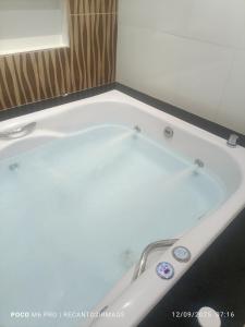 Casa de temporada com banheira de hidromassagem