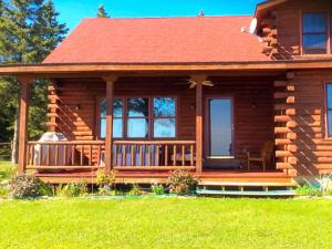 Fantastic Lakeside Log Cabin Rental for Six in Cedar River, Michigan