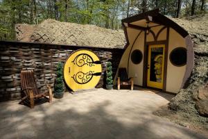 Charming Luxury Hobbit House with Private Hot Tub in Tranquil Woodlands on Littlefield Pond in Springvale, Maine