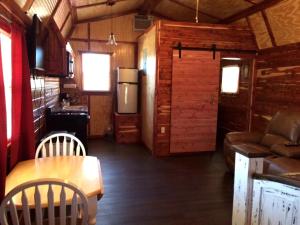 Rustic Cabin Rental with a Fishing Pond in Allen, Oklahoma