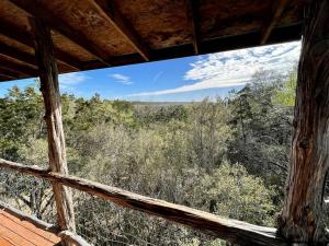 Two-Story Cabin Rental for Large Groups along Hamilton Creek in Marble Falls, Texas
