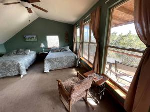 Two-Story Cabin Rental for Large Groups along Hamilton Creek in Marble Falls, Texas