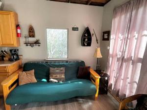 Two-Story Cabin Rental for Large Groups along Hamilton Creek in Marble Falls, Texas