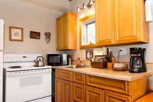 Two-Story Cabin Rental for Large Groups along Hamilton Creek in Marble Falls, Texas