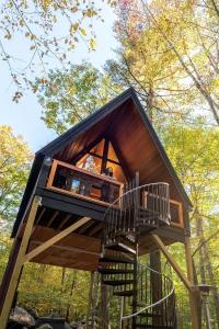 Eco-Friendly Solar Powered A-Frame Treehouse with Hot Tub and Private Dock on Littlefield Pond, near Wells, Maine