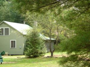Nestled Camping Cabin Rental Overlooking Lake near Glens Falls, New York