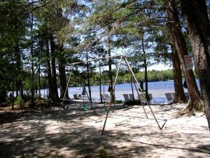 Cozy Cottage Rental with Lovely Beach Views on Halfmoon Lake, New Hampshire