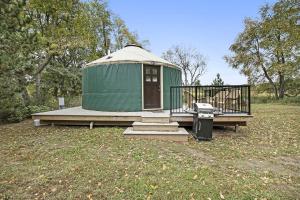 Secluded Off-Grid Yurt with Forest Views Near Trails in Sears, Michigan