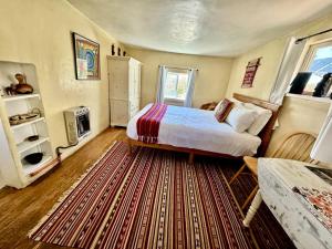 Charming Log Cabin Rental on Eco-Farm near Taos Ski Valley