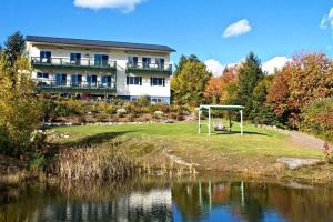 Peaceful Luxury Suite in a Bed and Breakfast with Balcony and Gorgeous Mountain Views by New Hampshire's Newfound Lake