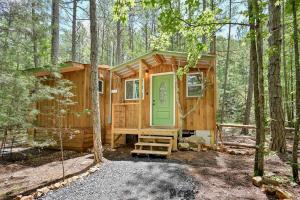 Cozy Tiny Cabin with Porch & Fire Pit near Scenic Trails in Western Arkansas