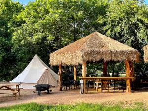 Relaxation and Fun Combined Glamping Tents M & In-Water Picnic Table L in Kingsbury, TX
